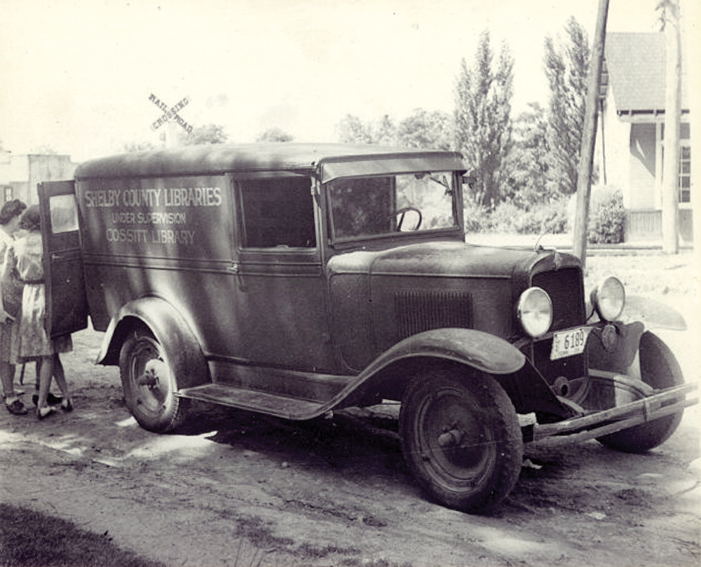 The bookmobile is shown here along Germantown Road across from The Depot in the 30s.